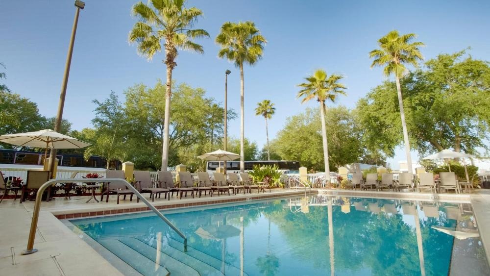 The Galleria Palms Resort-Style Pool Chaise Lounges Poolside Umbrellas